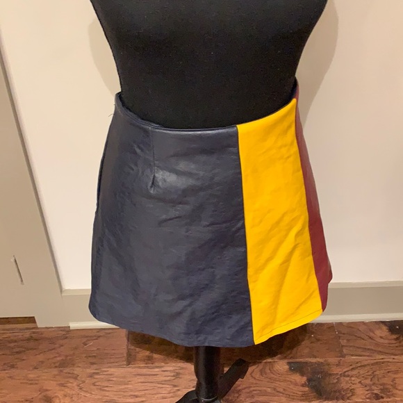a'gaci Dresses & Skirts - Colorblock leather mini skirt